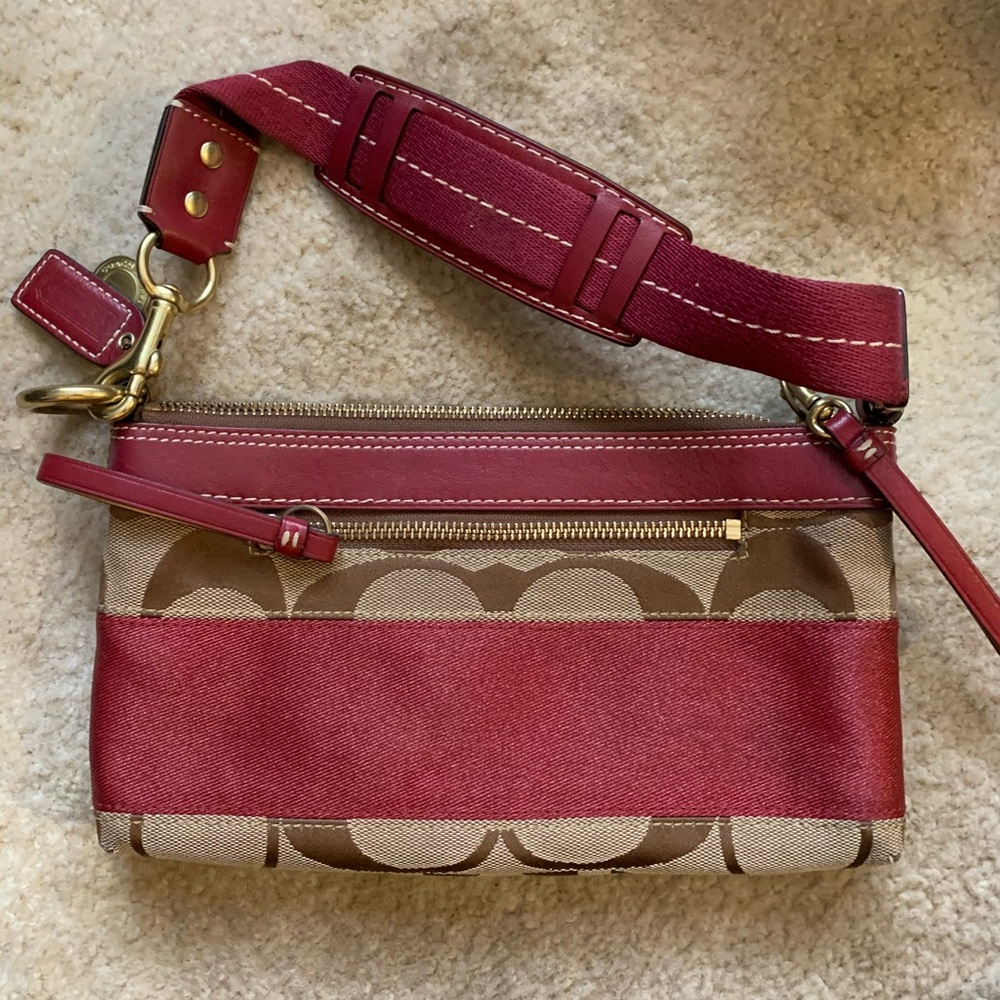 Red and tan small coach purse